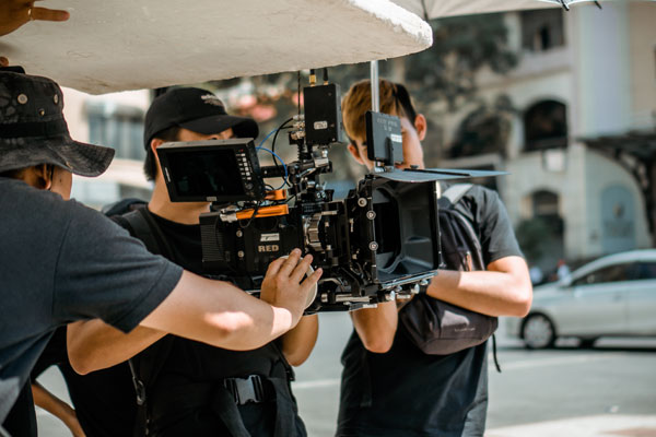 A film crew on a street.The region has secured  Government funding for the creative industries