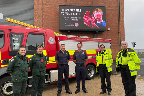 Fire, police and ambulance staff promoting staying safe during darker nights