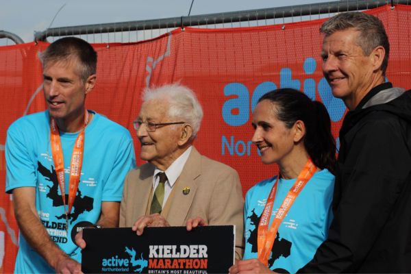 Male marathon winner RUSSELL MADDAMS, Arthur Scott, female marathon winner LUCIE CUSTANCE and event organiser Steve Cram