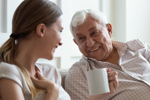 An older man having a cup of tea. Residents are encouraged to support Silver Sunday on October 2nd