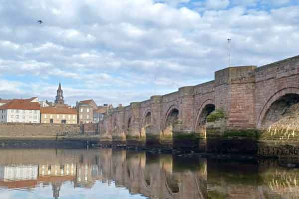 Berwick Old Bridge being surveyed by a drone