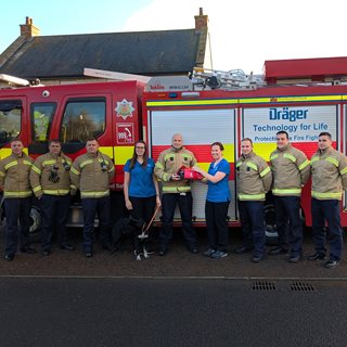 Northumberland Fire and Rescue Service alongside Abigail and Melanie from Robson and Prescott and Mia the dog
