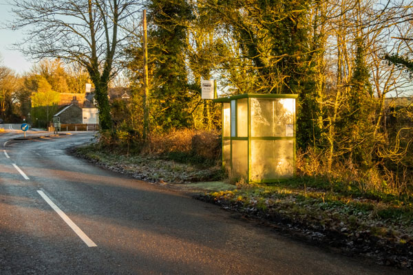 A rural bus stop. More electric buses are coming to the region