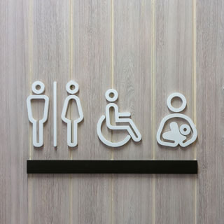 A graphic showing a toilets sign