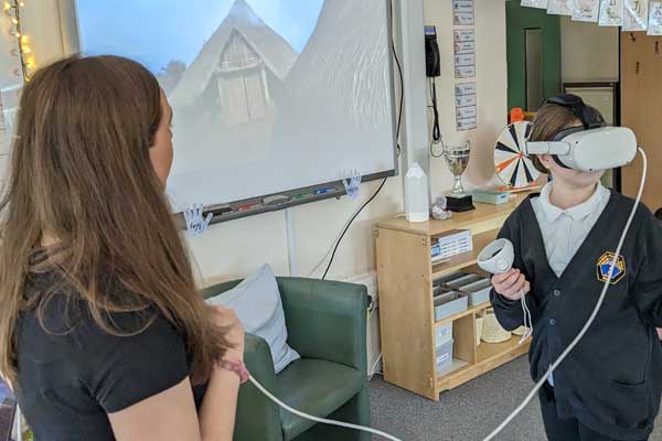 A Newsham Primary School pupil trying a virtual reality headset