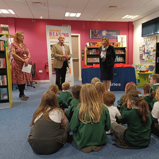 Glen Sanderson, Leader at Northumberland County Council hosting the Summer Reading Challenge awards ceremony at Haltwhistle Library