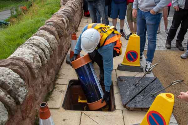 A time capsule being buried at the Union Chain Bridge