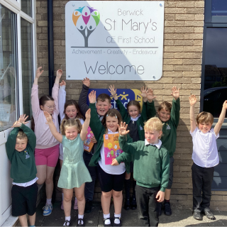 Group of children celebrating Walk to School Week