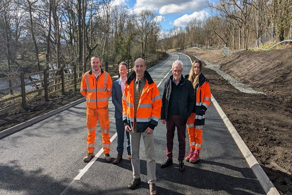 Contractors, council staff and councillors at the stretch of the B6344 which is re-opening to traffic