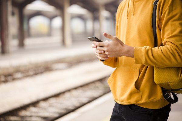 A passenger waiting for a train