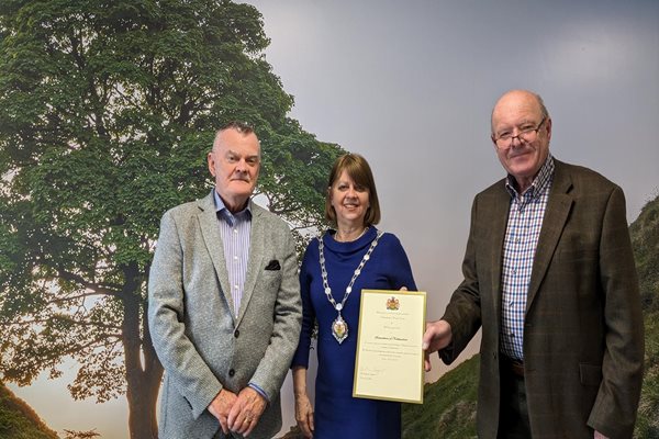 Ernie Patterson (Samaritans), Councillor Seymour and Julien Dicken (Samaritans) at County Hall