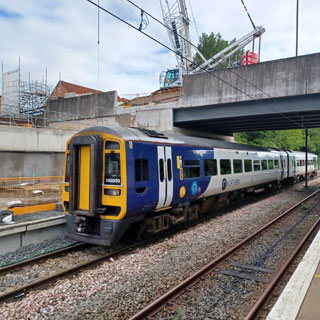 A train passing through Northumberland Park on the Northumberland Line