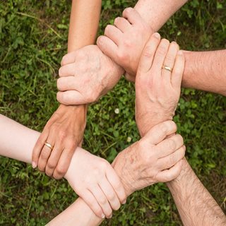 Hands holding each other