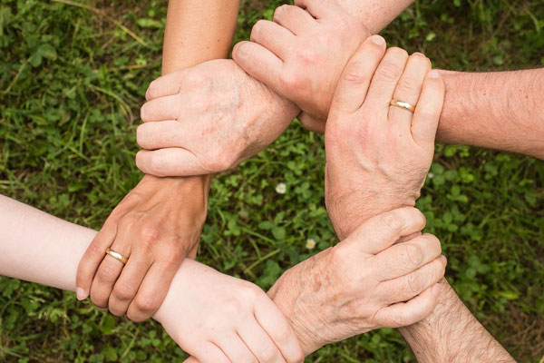 Hands holding each other