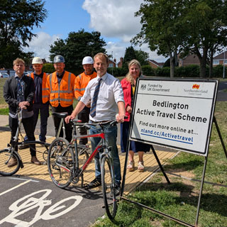 Councillors and staff with bikes in Bedlington
