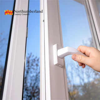 A person opening a UPVC window
