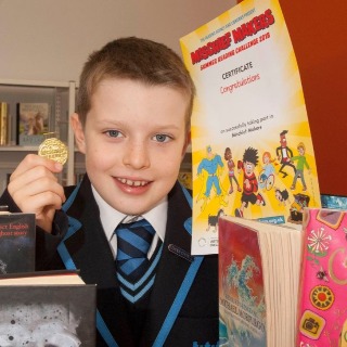 Image demonstrating Young reader wins bag of mischief