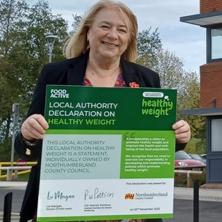 Councillor Wendy Pattison holds the Healthy Weight Declaration