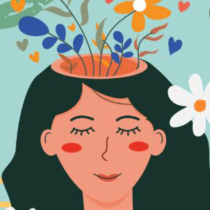 woman with eyes closed, smiling and surrounded by flowers 