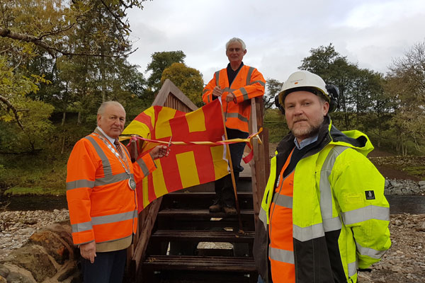 Councillor Ian Hutchinson, Roger Morris and Scott Wharton at the new bridge