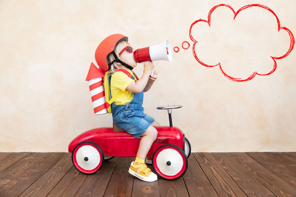 A child on a toy car