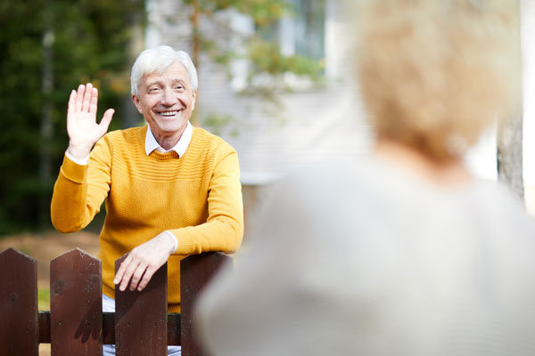 A neighbour waving