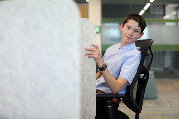 Apprentice working at desk